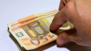 stock-footage-spending-money-timelapse-video-hand-taking-fifty-euro-notes-from-a-stack-concept-of-spending-300x168