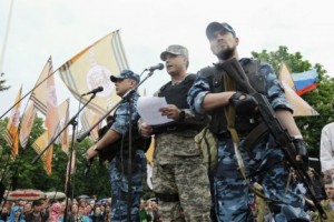 Self-styled governor of Luhansk region Bolotov delivers speech during rally to mark and celebrate announcement of results of referendum on status of Luhansk region in Luhansk