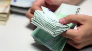 stock-footage-male-hands-counting-euro-banknotes