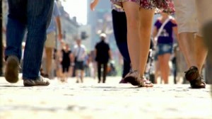 stock-footage-walking-peoples-crowd-rushing-on-the-street-slow-down